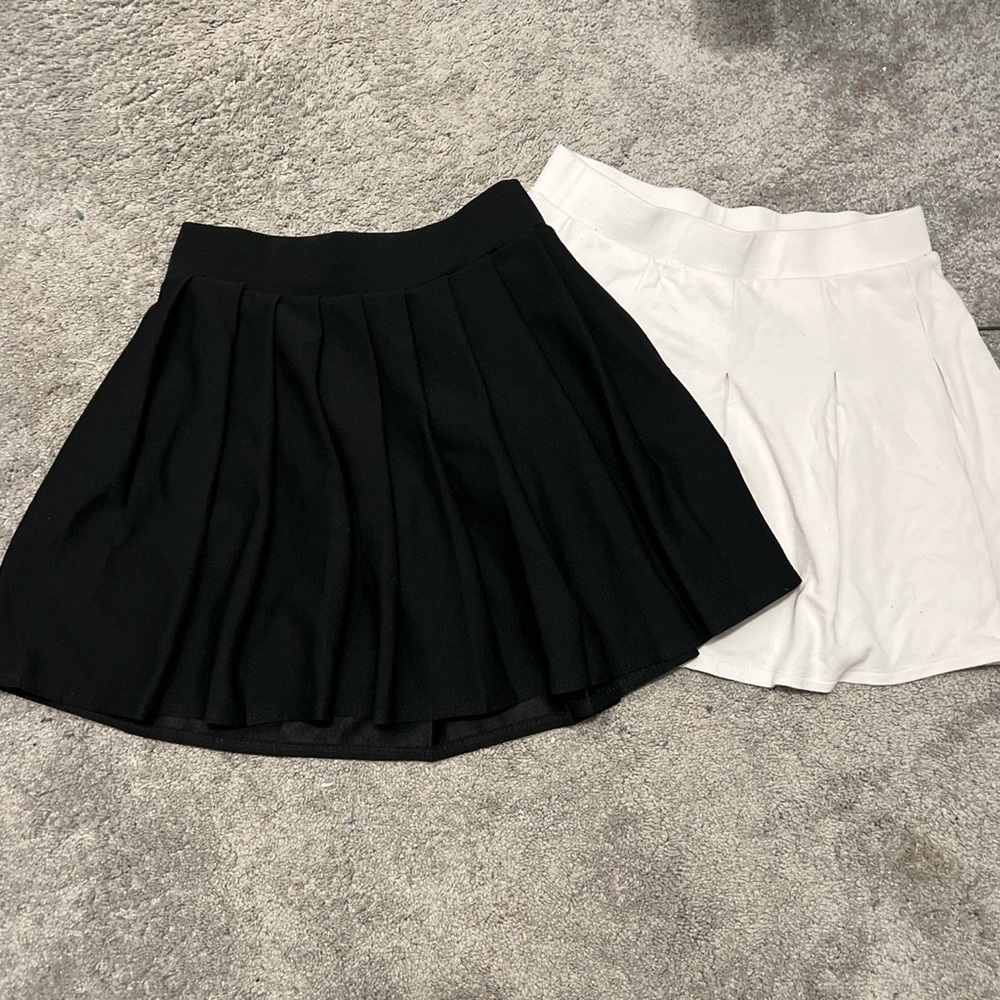 Black and white skirts!! (can buy separately)originally: 25 each now : 10 each